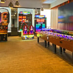 Supersized 12-player LED foosball table with LED NBA Hoops basketball rental Las Vegas event center