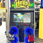 Guitar Hero arcade with custom made marquee branding for corporate party in San Diego from Video Amusement