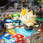Pokemon pinball machine integrates video clips for series ready to be rented by Video Amusement Las Vegas