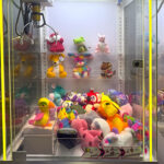 Wonder Claw Prize Crane Machine with shelving for rent from Video Amusement Los Angeles San Diego